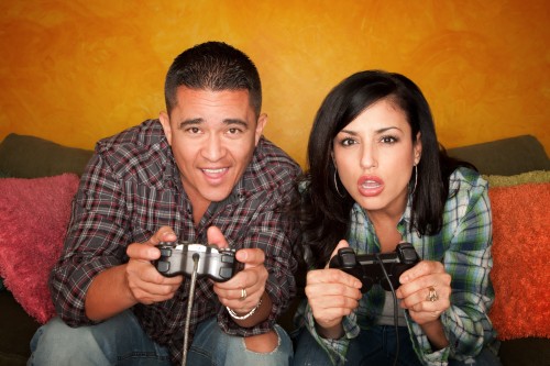 hispanic-couple-playing-video-game