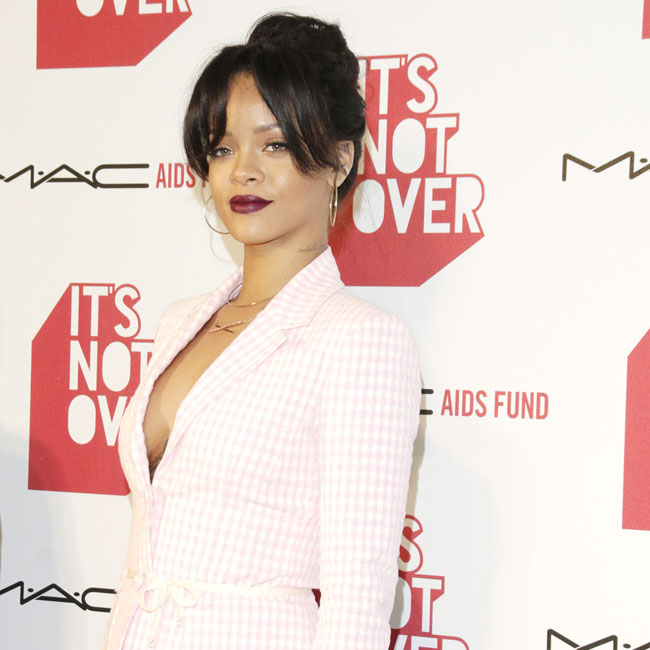 Rihanna arrives at the MAC Cosmetics and The MAC AIDS Fund Present Worldwide Premiere of 'It's Not Over' in Los Angeles