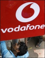 Vodafone yearly profits up, CEO to step down