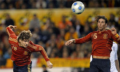 Spain cut England down to size