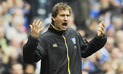 Adams stands down at Portsmouth