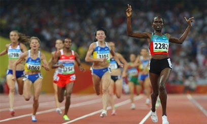 Lagat does it again