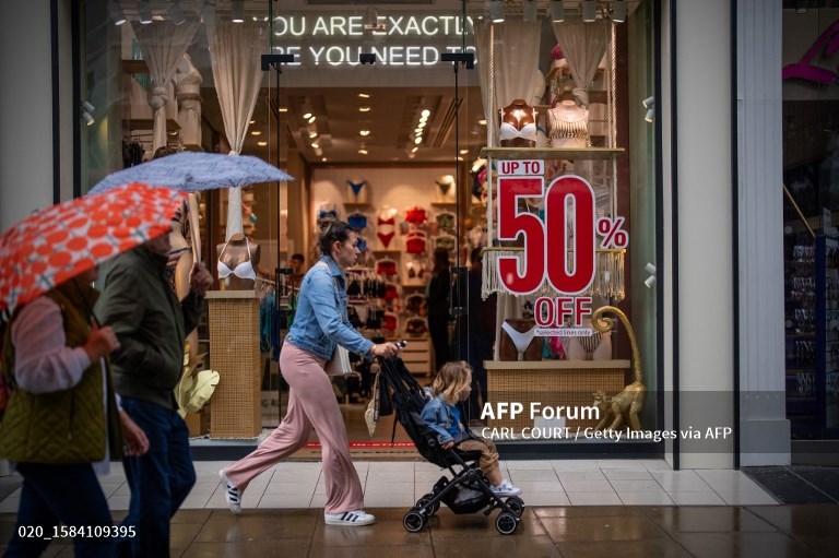 Wet July dampens UK retail sales, spending outlook