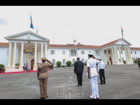 Uhuru mourns Kibaki in emotional military parade