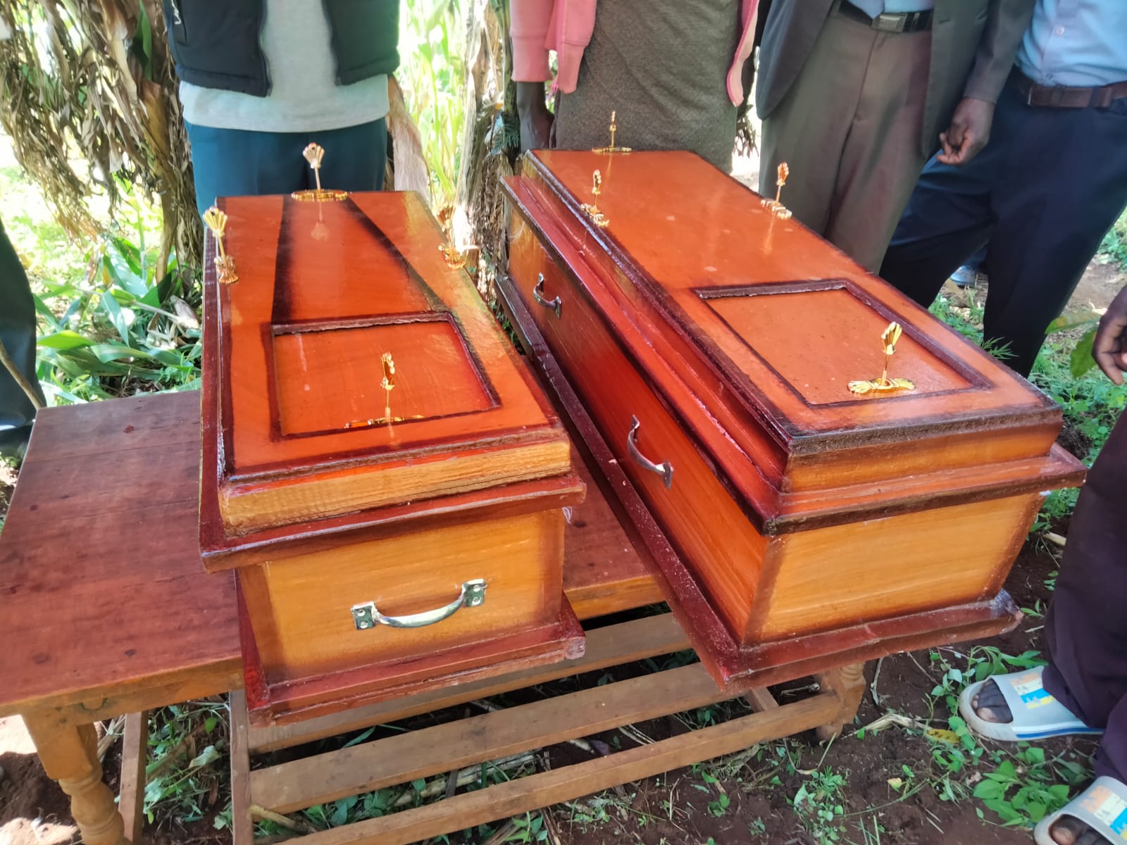 KNCHR Commissioners attend burial of two kids hacked to death by father in Kisii