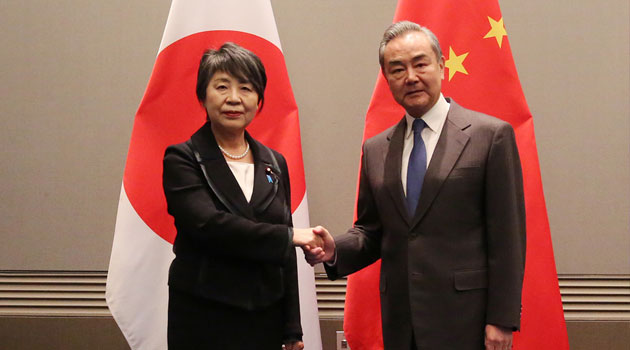 China, Japan should push forward ties along right track of sound development: Wang Yi — China Daily