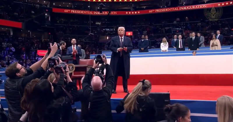 (WATCH) Crowd goes wild as Trump throws pens used to sign executive orders into them