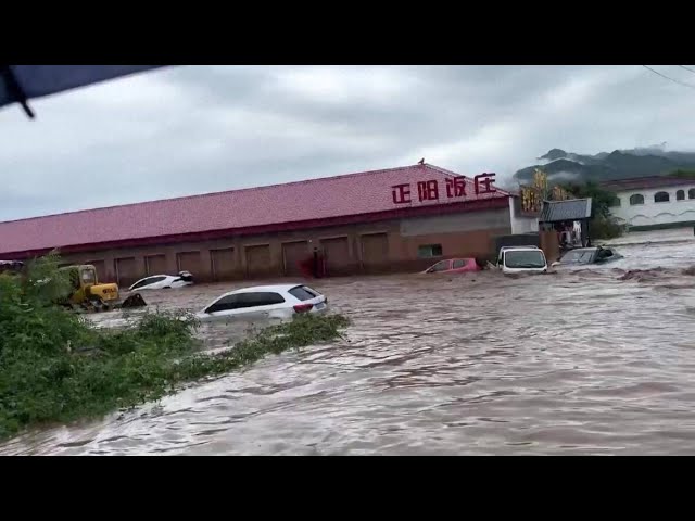 (WATCH) Firefighters rescue trapped residents as deadly flash floods sweep Beijing, killing at least 30