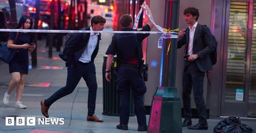 Police officer among four dead in shooting at New York City office building