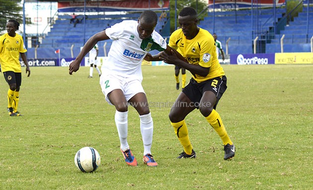 Mathare United winger Daniel Mwaura attempts to go past Tusker FC defender James Situma/ PHOTO- Courtesy