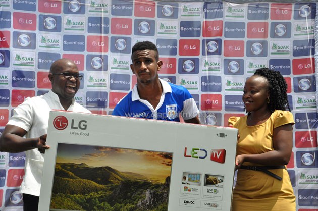 Bandari FC defender Shariff Mohammed receiving his award after being named Player of the Month for March.PHOTO/SJAK