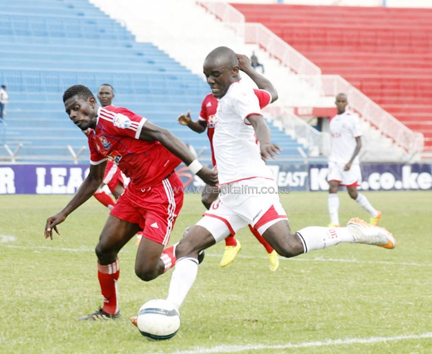Ulinzi Stars midfielder Mark Makwatta against Ushuru's Salim Abdalla.PHOTO/Raymond Makhaya