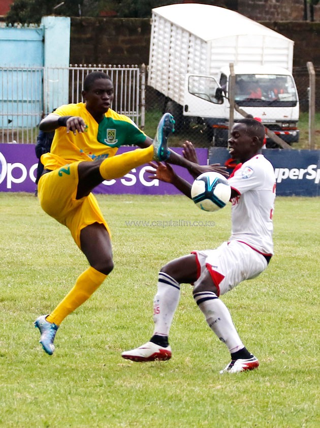 Ulinzi Stars right back brian Birgen attempts to cut out Mathare midfielder Eric Johannah/ PHOTO- COURTESY