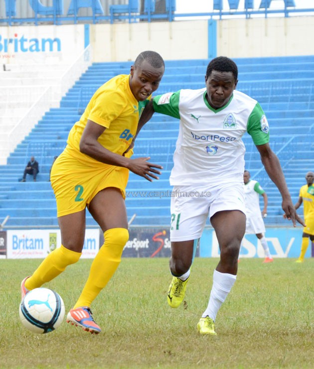 Mathare United's-Daniel Mwaura against Gor Mahia's Eric Ouma.PHOTO/Timothy Olobulu.