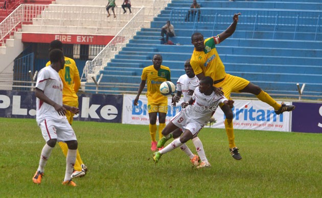 Mathare United's George Owino heads the ball away from Western Stima's Francis Ochollah/PHOTO-Timothy Olobulu