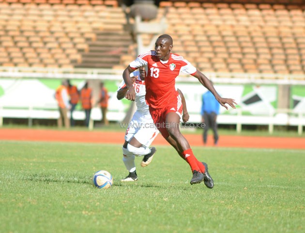 Paul Were of Kenya tackles Sudan Mudathir Eltayed.PHOTO/Raymond Makhaya.