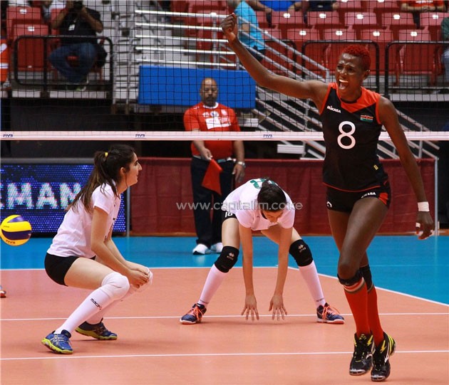 Kenya's Triza Atuka celebrates as the Algerian show their disappointment.