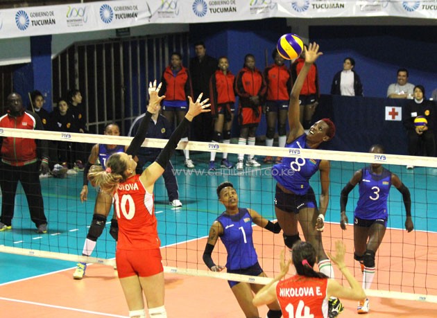 Kenya's Malkia Strikers Triza Atuka spiking against Bulgaria.