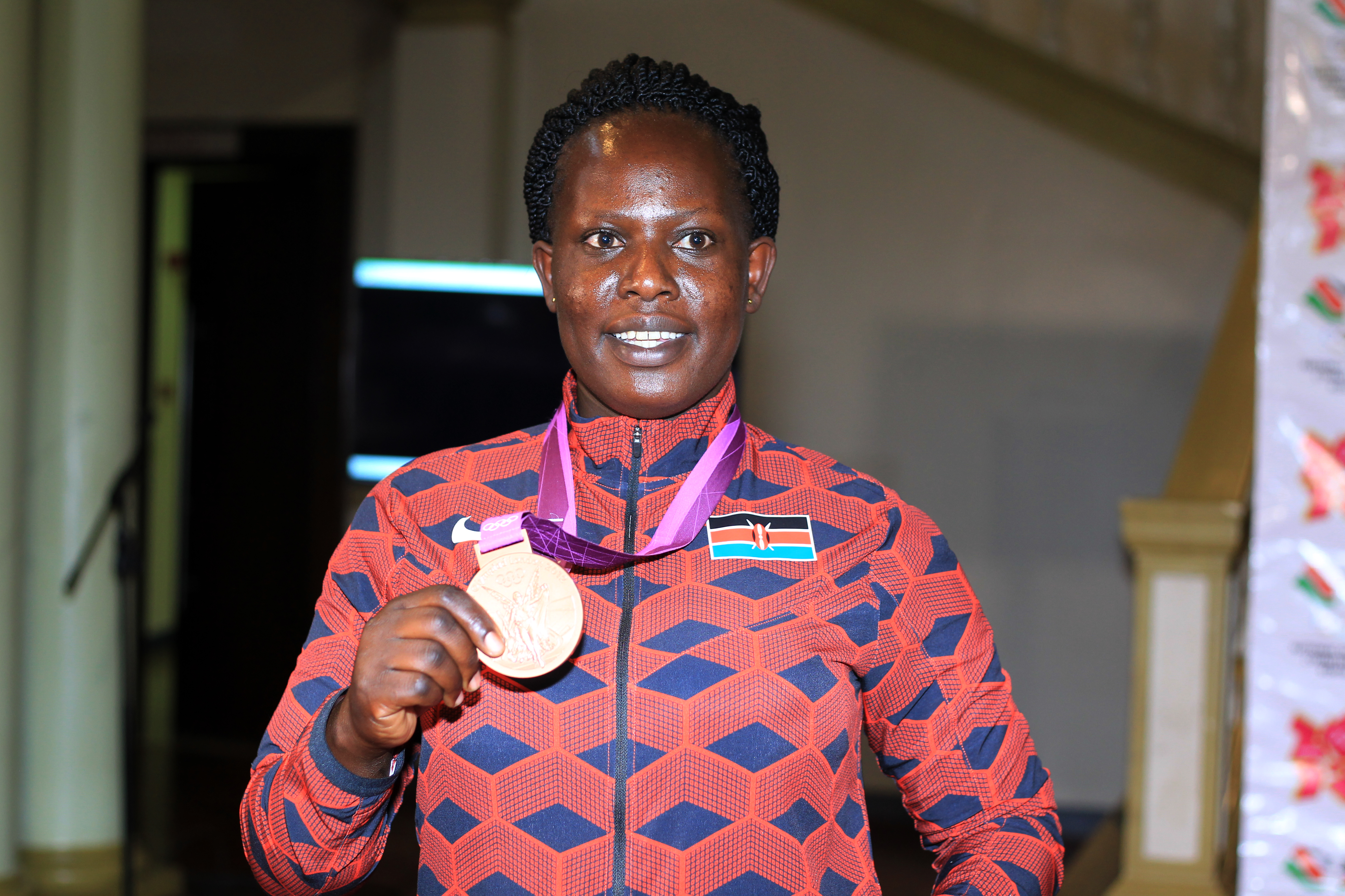 Olympic champ Jelimo surprises her kids with big reveal about her past