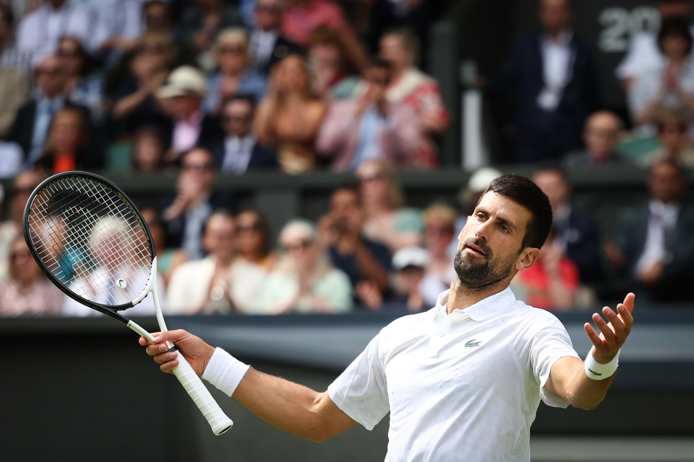 Australian Open: Djokovic battles past Popyrin to reach third round